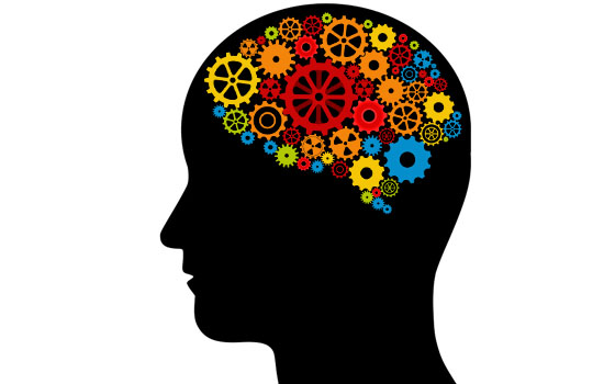 Immagine in cui è rappresentata una testa nera con ingranaggi colorati a livello del cervello